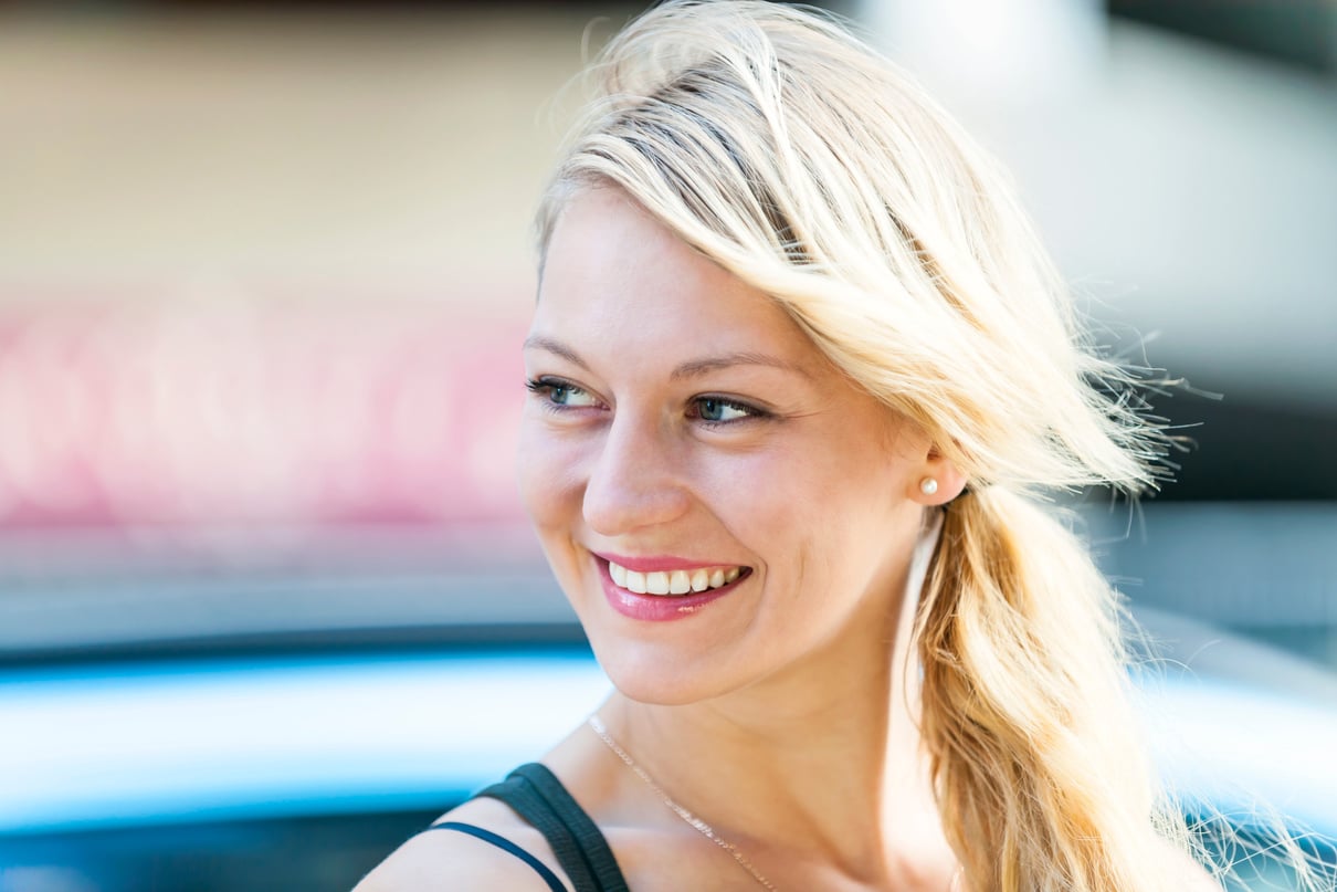 Young Blonde Woman Smiling